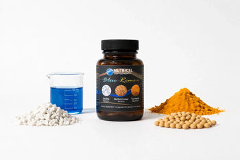 Nutricel Blue Remove supplement bottle with zeolite, nattokinase, and turmeric ingredients alongside a beaker of blue liquid on a white background
