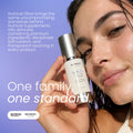 A close-up lifestyle shot of a woman holding a bottle of Nutricel Glow G-Ku Cu E-Serum, with water droplets on her face against a lavender background and promotional text.